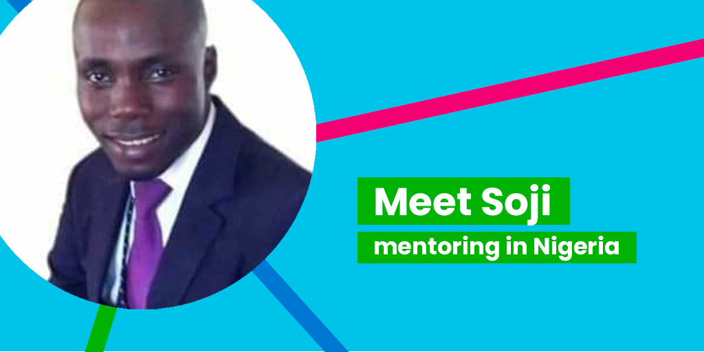 Technovation Mentor Feature - A photo of a Nigerian man in a suit smiling at the camera on a blue background